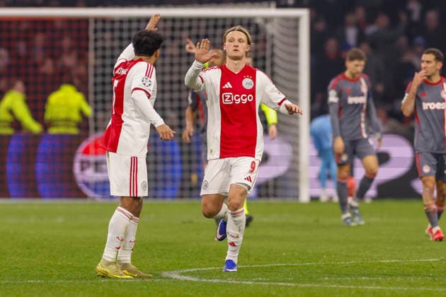 2026-01-28 AFC Ajax v Olympiacos FC - UEFA Champions League AMSTERDAM, NETHERLANDS - JANUARY 28: Kasper Dolberg of AFC Ajax is celebrating with his teammate Owen Wijndal of AFC Ajax after scoring their teams first goal from a penalty during the UEFA Champions League match between AFC Ajax and Olympiacos FC at Johan Cruijff ArenA on January 28, 2026 in Amsterdam, Netherlands. Amsterdam Johan Cruijff ArenA Netherlands Content not available for redistribution in The Netherlands directly or indirectly through any third parties. Copyright: xBenxGalx