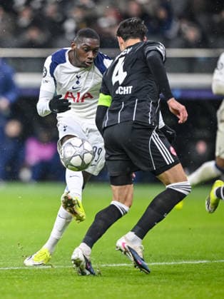 Randal Kolo Muani Tottenham Hotspur and Robin Koch Eintracht Frankfurt battle for the ball during the UEFA Champions League 2025 26 League Phase MD8 match between Eintracht Frankfurt and Tottenham Hotspur at Frankfurt Stadion on January 28, 2026 in Frankfurt am Main, Germany Photo by Harry Langer DeFodi Images