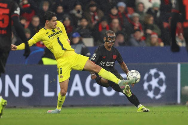 Sergi Cardona Villarreal CF and Arthur Bayer 04 Leverkusen battle for the ball during the UEFA Champions League 2025 26 League Phase MD8 match between Bayer 04 Leverkusen and Villarreal CF at BayArena on January 28, 2026 in Leverkusen, Germany Photo by Oliver Kaelke DeFodi Images