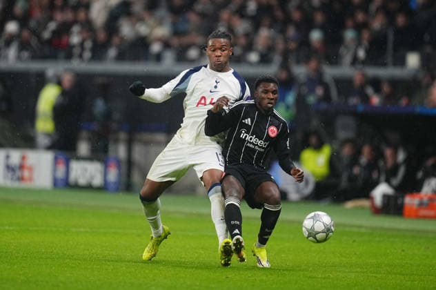 Destiny Udogie Tottenham Hotspur and Aurelio Buta Eintracht Frankfurt battle for the ball the UEFA Champions League 2025 26 League Phase match between Eintracht Frankfurt and Tottenham Hotspur, Deutsche Bank Arena on January 28, 2026 in Frankfurt, Germany Photo by Thor Wegner DeFodi Images