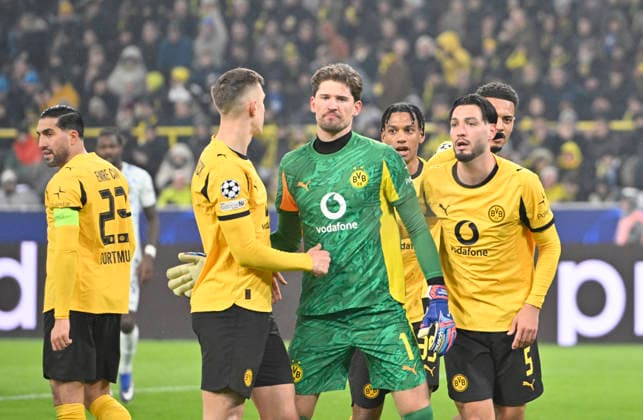 v l Emre Can Borussia Dortmund , Nico Schlotterbeck Borussia Dortmund , goalkeeper Gregor Kobel Borussia Dortmund , Filippo Mane Borussia Dortmund , Ramy Bensebaini Borussia Dortmund high-five each other, Football Champions League, Borussia Dortmund Inter Milan, Matchday 8, on 28 01 2026 in Dortmund Germany UEFA regulations prohibit any use of photographs as image sequences and or quasi video Â
