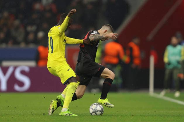 Nicolas PÃ pÃ Villarreal CF and Alejandro Grimaldo Bayer 04 Leverkusen battle for the ball during the UEFA Champions League 2025 26 League Phase MD8 match between Bayer 04 Leverkusen and Villarreal CF at BayArena on January 28, 2026 in Leverkusen, Germany Photo by Oliver Kaelke DeFodi Images