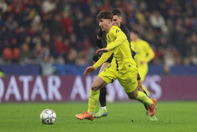 Pau Navarro Villarreal CF and Patrik Schick Bayer 04 Leverkusen battle for the ball during the UEFA Champions League 2025 26 League Phase MD8 match between Bayer 04 Leverkusen and Villarreal CF at BayArena on January 28, 2026 in Leverkusen, Germany Photo by Oliver Kaelke DeFodi Images