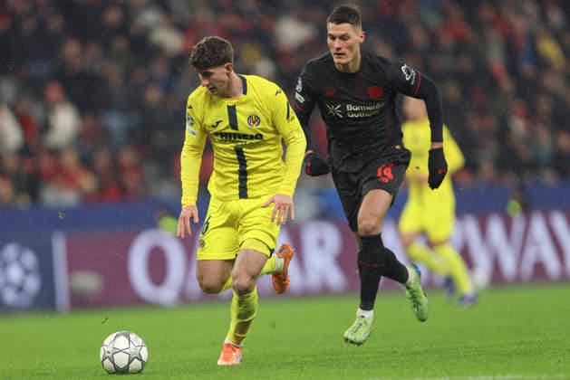 Pau Navarro Villarreal CF and Patrik Schick Bayer 04 Leverkusen battle for the ball during the UEFA Champions League 2025 26 League Phase MD8 match between Bayer 04 Leverkusen and Villarreal CF at BayArena on January 28, 2026 in Leverkusen, Germany Photo by Oliver Kaelke DeFodi Images