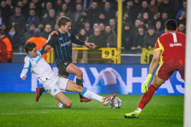 Club s Romeo Vermant and Marseille s Nayef Aguerd fight for the ball during a soccer game between Belgian Club Brugge and French Olympique de Marseille, Wednesday 28 January 2026 in Brugge, on day eight of the League phase of the UEFA Champions League tournament. KURTxDESPLENTER  x159388110x