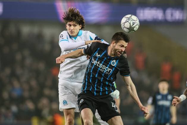 Marseille s Leonardo Balerdi and Club s Brandon Mechele fight for the ball during a soccer game between Belgian Club Brugge and French Olympique de Marseille, Wednesday 28 January 2026 in Brugge, on day eight of the League phase of the UEFA Champions League tournament. BRUNOxFAHY  x159393239x