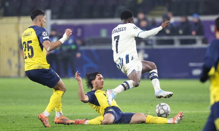 Union s Kevin Mac Allister and Atalanta s Kamaldeen Sulemana fight for the ball during a soccer game between Belgian Royale Union Saint-Gilloise and Italian Atalanta Bergamo, on Wednesday 28 January 2026 in Brussels, on the eight day of the League phase of the UEFA Champions League tournament. VIRGINIExLEFOUR  x159403727x