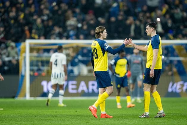 Union s Fedde Leysen and Union s Ross Sykes celebrate after winning a soccer game between Belgian Royale Union Saint-Gilloise and Italian Atalanta Bergamo, on Wednesday 28 January 2026 in Brussels, on the eight day of the League phase of the UEFA Champions League tournament. JASPERxJACOBS  x159405559x