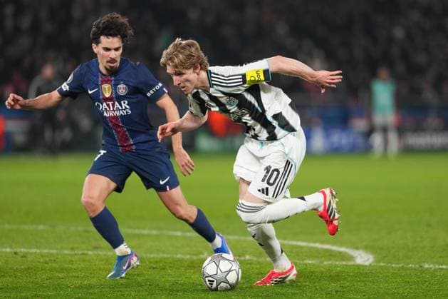 Anthony Gordon of Newcastle takes on Vitinha of PSG Paris Saint-Germain v Newcastle United, UEFA Champions League, Group Stage, Football, Parc des Princes, Paris, France - 28 Jan 2026Paris Parc des Princes France EDITORIAL USE ONLY No use with unauthorised audio, video, data, fixture lists, club league logos or live services. Online in-match use limited to 120 images, no video emulation. No use in betting, games or single club league player publications. Copyright: xDavexWinter Shutterstockx 16429499iw