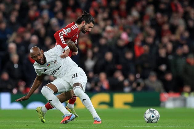 28th January 2026; Anfield, Liverpool, Merseyside, England; UEFA Champions League Football, Liverpool versus Qarabag; Dominik Szoboszlai of Liverpool competes for the ball with Kevin Medina of Qarabag  DavidxBlunsden Content restricted for UK based newspaper