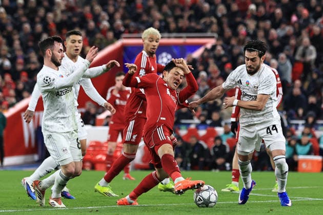 28th January 2026; Anfield, Liverpool, Merseyside, England; UEFA Champions League Football, Liverpool versus Qarabag; Wataru Endo of Liverpool is tackled by Elvin Cafarquliyev of Qarabag  DavidxBlunsden Content restricted for UK based newspaper