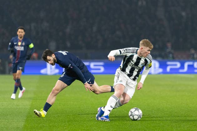 Paris Saint-Germain v Newcastle United FC - UEFA Champions League 2025 26 League Phase MD8 Khvicha Kvaratskhelia of Paris Saint-Germain (L) and Lewis Hall of Newcastle United (R) participate in the UEFA Champions League - League phase, Matchday 8 - football match between Paris Saint-Germain (PSG) and Newcastle United FC at the Parc des Princes stadium. Paris France  Copyright: xIbrahimxEzzatx originalFilename:ezzat-notitle260128_np32B.jpg