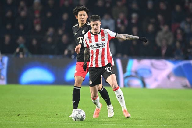 Dennis MAN PSV vs Hiroki ITO M action, duel, PSV Eindhoven PSV FC Bayern Muenchen M 1 2 Football Champions League, 8 matchday, matchday8, on 28 01 2026 at Philips Stadion Eindhoven Netherlands UEFA regulations prohibit any use of photographs as image sequences and or quasi video Â