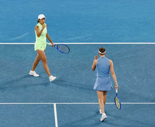 (260129) -- MELBOURNE, Jan. 29, 2026 -- Zhang Shuai (L) Elise Mertens celebrate scoring during the women s doubles semifinal match between Zhang Shuai (China) Elise Mertens (Belgium) and Shibahara Ena (Japan) Vera Zvonareva (Russia) at the Australian Open tennis tournament in Melbourne, Australia, Jan. 29, 2026. ) (SP)AUSTRALIA-MELBOURNE-TENNIS-AUSTRALIAN OPEN-WOMEN S DOUBLES-SEMIFINALS MaxPing 