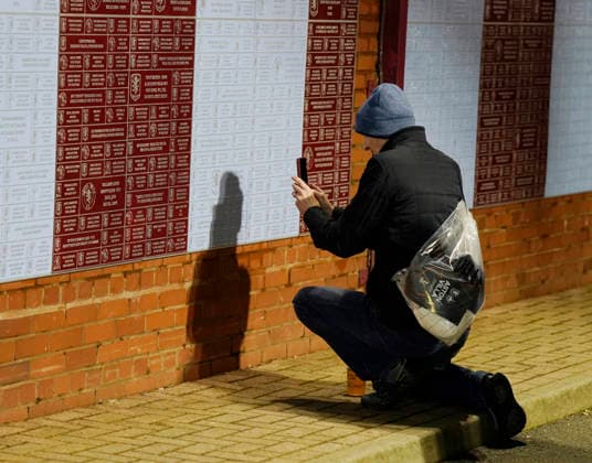 Birmingham, England, 29th January 2026. Fans take pictures of the Aston Villa Legacy wall before the Aston Villa vs FC Salzburg UEFA Europa League match at Villa Park, Birmingham. Picture credit should read: Andrew Yates Sportimage EDITORIAL USE ONLY. No use with unauthorised audio, video, data, fixture lists, club league logos or live services. Online in-match use limited to 120 images, no video emulation. No use in betting, games or single club league player publications. SPI_001_AY_Villa_Salzburg SPI-4490-0002