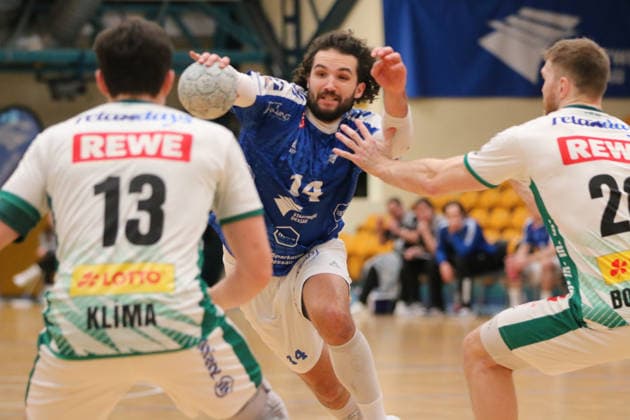 29 01 2026 Handball Men 2025 2026 Test match Dessau Roßlauer HV 06 SC DHFK Leipzig Anhalt Arena Dessau Jakub Powarzynski Dessau, 14, blue prevails against William Bogojevic Leipzig, 20, white and Matej Klima Leipzig, 13, white Dessau Roßlau Saxony Anhalt Germany