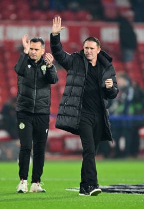 Nottingham, England, 29th January 2026. Robbie Keane manager of Ferencvaros (r) waves to the fans during the Nottingham Forest vs Ferencvaros UEFA Europa League match at the City Ground, Nottingham. Picture credit should read: Harriet Massey Sportimage EDITORIAL USE ONLY. No use with unauthorised audio, video, data, fixture lists, club league logos or live services. Online in-match use limited to 120 images, no video emulation. No use in betting, games or single club league player publications. SPI_020_HM_Forest_Ferencvaros SPI-4491-0020