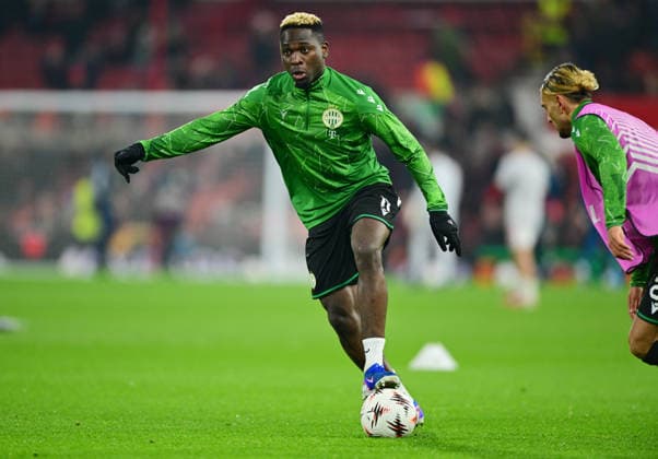 Nottingham, England, 29th January 2026. Bamidele Yusuf of Ferencvaros warming up during the Nottingham Forest vs Ferencvaros UEFA Europa League match at the City Ground, Nottingham. Picture credit should read: Harriet Massey Sportimage EDITORIAL USE ONLY. No use with unauthorised audio, video, data, fixture lists, club league logos or live services. Online in-match use limited to 120 images, no video emulation. No use in betting, games or single club league player publications. SPI_024_HM_Forest_Ferencvaros SPI-4491-0024