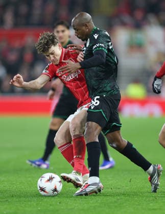 Nottingham Forest v Ferencvarosi TC UEFA Europa League Ryan Yates of Nottingham Forest tackles Julio Romao of Ferencvaros during the UEFA Europa League match at the City Ground, Nottingham 29 01 2026 UK Newspapers OUT Copyright: xAndyxSumnerx FIL-22875-0013