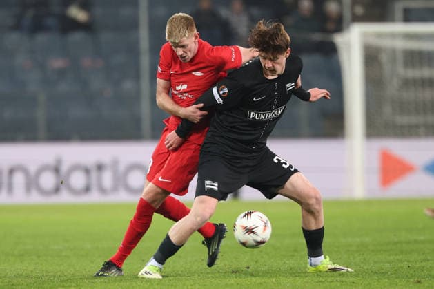 SOCCER - UEFA EL, Sturm vs Brann GRAZ,AUSTRIA,29.JAN.26 - SOCCER - UEFA Europa League, SK Sturm Graz vs SK Brann Bergen. Image shows Thore Pedersen (Brann) and Luca Weinhandl (Sturm).  GEPAxpictures xChrisxBauer