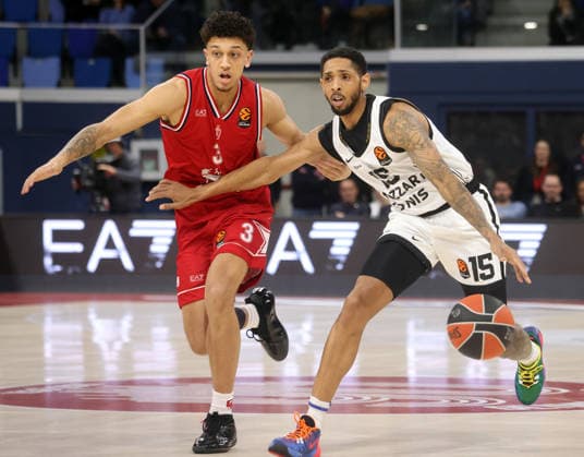 January 29, 2026, Milan, MILAN: Partizan Mozart Bet Belgrade s Cameron Payne (R) goes for the basket against EA7 Emporio Armani Milan s Quinn Ellis during the Euroleague basketball match between EA7 Emporio Armani Milan and Partizan Mozart Bet Belgrade in Milan, Italy, 29 January 2026..ANSA MATTEO BAZZI Basket; Euroleague: EA7 Emporio Armani Milan Vs Partizan Mozart Bet Belgrade  - ZUMAa110 20260129_zaf_a110_048 Copyright: xMatteoxBazzix