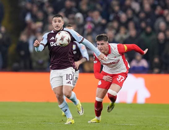 Birmingham, England, 29th January 2026. Emiliano Buendia of Aston Villa and Tim Trummer of Red Bull Salzburg during the Aston Villa vs FC Salzburg UEFA Europa League match at Villa Park, Birmingham. Picture credit should read: Andrew Yates Sportimage EDITORIAL USE ONLY. No use with unauthorised audio, video, data, fixture lists, club league logos or live services. Online in-match use limited to 120 images, no video emulation. No use in betting, games or single club league player publications. SPI_036_AY_Villa_Salzburg SPI-4490-0035