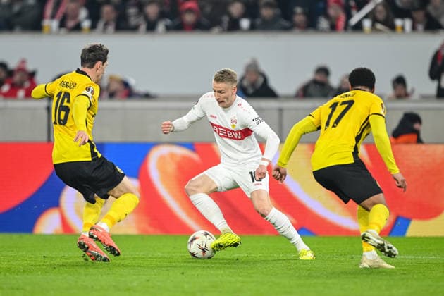 Christian Fassnacht BSC Young Boys , Chris Führich VfB Stuttgart and Daidy Janko BSC Young Boys battle for the ball during the UEFA Europa League 2025 26 League Phase MD8 match between VfB Stuttgart and BSC Young Boys at Stuttgart Arena on January 29, 2026 in Stuttgart, Germany Photo by Harry Langer DeFodi Images