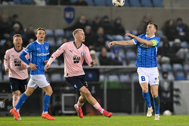 260129 KRC Genk vs Malmo FF Daniel Gudjohnsen (32) of Malmo defending on Bryan Heynen (8) of Genk pictured during the 8th game in the Uefa Europa League season 2025-2026 League Phase between KRC Genk and Malmo FF from Sweden on January 29 , 2026 in Genk, Belgium. (Photo by David Catry Isosport) Genk Belgium  Copyright: xDavidxCatryx 20260129DC2_1937