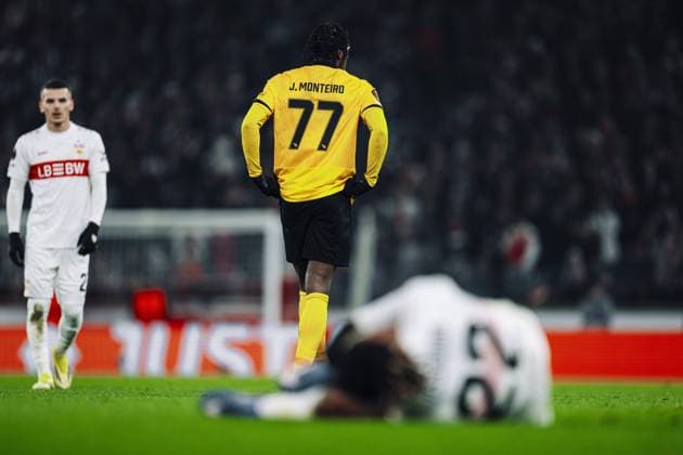 Badredine Bouanani 27 VfB Stuttgart stands while a VfB Stuttgart player lies on the ground and Joël Monteiro 77 BSC Young Boys looks on Match scene with injury Copyright: xspeedshotx
