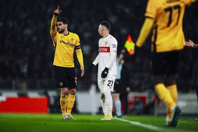 Loris Benito 23 BSC Young Boys gesticulates while Badredine Bouanani 27 VfB Stuttgart listens attentively Discussion on the pitch Copyright: xspeedshotx