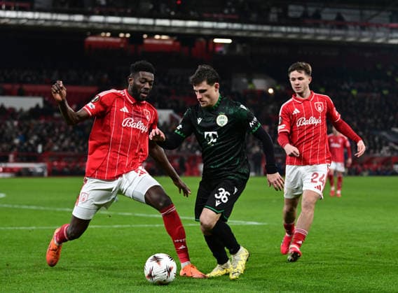 Nottingham, England, 29th January 2026. Ibrahim Sangare of Nottingham Forest (l) tussles with Gabi Kanichowsky of Ferencvaros during the Nottingham Forest vs Ferencvaros UEFA Europa League match at the City Ground, Nottingham. Picture credit should read: Harriet Massey Sportimage EDITORIAL USE ONLY. No use with unauthorised audio, video, data, fixture lists, club league logos or live services. Online in-match use limited to 120 images, no video emulation. No use in betting, games or single club league player publications. SPI_053_HM_Forest_Ferencvaros SPI-4491-0052