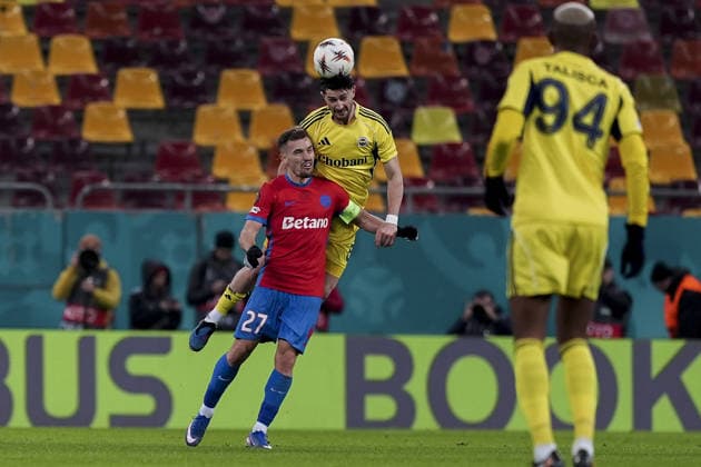 FCSB v Fenerbahce - UEFA Europa League BUCHAREST, ROMANIA - JANUARY 29: Ismail Yuksek of Fenerbahce in action against Darius Olaru (27) of FCSB during the UEFA Europa League Week 8 football match between FCSB and Fenerbahce in Bucharest, Romania on January 29, 2026. Arife Karakum Anadolu Bucharest Romania. Editorial use only. Please get in touch for any other usage.  Copyright: x2026xAnadoluxArifexKarakumx