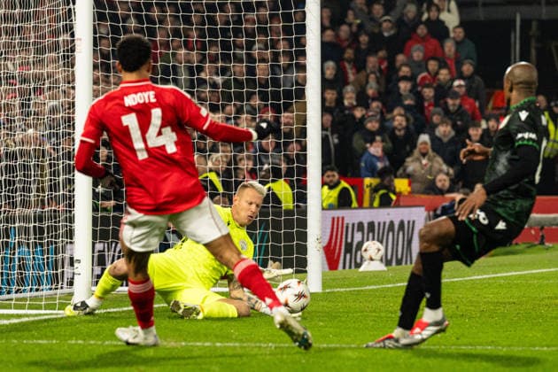29th January 2026; The City Ground, Nottingham, England; UEFA Europa League Football, Nottingham Forest versus Ferencvarosi; David Grof of Ferencvarosi TC saves the shot from Dan Ndoye of Nottingham Forest  GodfreyxPitt Content restricted for UK based newspaper