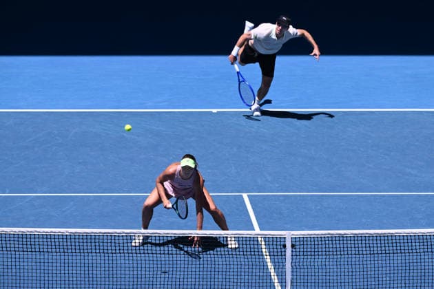 TENNIS AUSTRALIAN OPEN, Olivia Gadecki and John Peers of Australia in action against Kristina Mladenovic and Manuel Guinard of France during the mixed doubles final on day 13 of the 2026 Australian Open tennis tournament at Melbourne Park in Melbourne, Friday, January 30, 2026. ( NO ARCHIVING MELBOURNE VICTORIA AUSTRALIA  Copyright: xJOELxCARRETTx 20260130160535152174