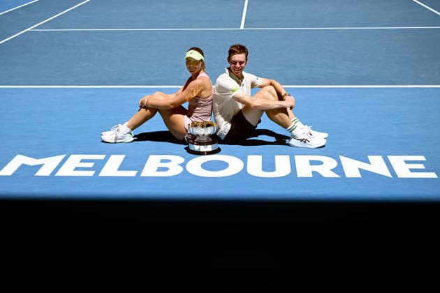 TENNIS AUSTRALIAN OPEN, Olivia Gadecki and John Peers of Australia pose with the trophy following their win over Kristina Mladenovic and Manuel Guinard of France in the mixed doubles final on day 13 of the 2026 Australian Open tennis tournament at Melbourne Park in Melbourne, Friday, January 30, 2026. ( NO ARCHIVING MELBOURNE VICTORIA AUSTRALIA  Copyright: xJOELxCARRETTx 20260130173862287424
