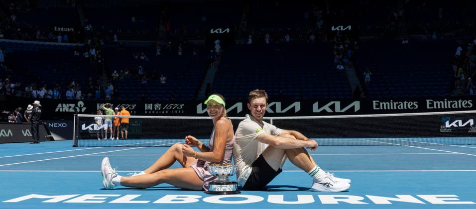 (260130) -- MELBOURNE, Jan. 30, 2026 -- Olivia Gadecki (L) John Peers pose with the trophy after winning the mixed doubles final match between Olivia Gadecki John Peers of Australia and Kristina Mladenovic Manuel Guinard of France at the Australian Open tennis tournament in Melbourne, Australia, Jan. 30, 2026. (Photo by Xinhua) (SP)AUSTRALIA-MELBOURNE-TENNIS-AUSTRALIAN OPEN-MIXED DOUBLES-FINAL HuxJingchen 