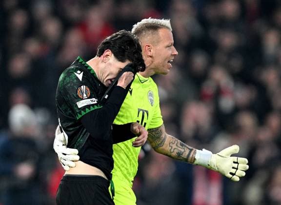 David Grof goalkeeper of Ferencvaros comforts Bence Ötvös after he scored an own goal Nottingham Forest v Ferencvaros, UEFA Europa League, Group Stage, Football, City Ground, Nottingham, UK - 29 Jan 2026Nottingham City Ground United Kingdom EDITORIAL USE ONLY No use with unauthorised audio, video, data, fixture lists, club league logos or live services. Online in-match use limited to 120 images, no video emulation. No use in betting, games or single club league player publications. Copyright: xAnnaxGowthorpe Shutterstockx 16445882au