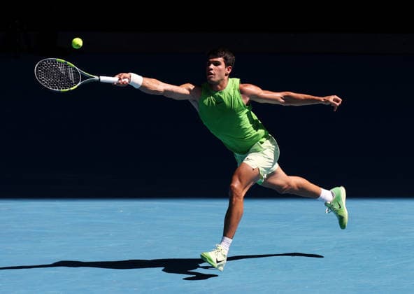 (260130) -- MELBOURNE, Jan. 30, 2026 -- Carlos Alcaraz hits a return during the men s singles semifinal match between Carlos Alcaraz of Spain and Alexander Zverev of Germany at the Australian Open tennis tournament in Melbourne, Australia, Jan. 30, 2026. ) (SP)AUSTRALIA-MELBOURNE-TENNIS-AUSTRALIAN OPEN-MEN S SINGLES-SEMIFINAL MaxPing 