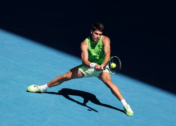 (260130) -- MELBOURNE, Jan. 30, 2026 -- Carlos Alcaraz hits a return during the men s singles semifinal match between Carlos Alcaraz of Spain and Alexander Zverev of Germany at the Australian Open tennis tournament in Melbourne, Australia, Jan. 30, 2026. ) (SP)AUSTRALIA-MELBOURNE-TENNIS-AUSTRALIAN OPEN-MEN S SINGLES-SEMIFINAL MaxPing 