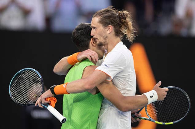 (260130) -- MELBOURNE, Jan. 30, 2026 -- Carlos Alcaraz (L) hugs Alexander Zverev after the men s singles semifinal match between Carlos Alcaraz of Spain and Alexander Zverev of Germany at the Australian Open tennis tournament in Melbourne, Australia, Jan. 30, 2026. (Photo by Xinhua) (SP)AUSTRALIA-MELBOURNE-TENNIS-AUSTRALIAN OPEN-MEN S SINGLES-SEMIFINAL HuxJingchen 