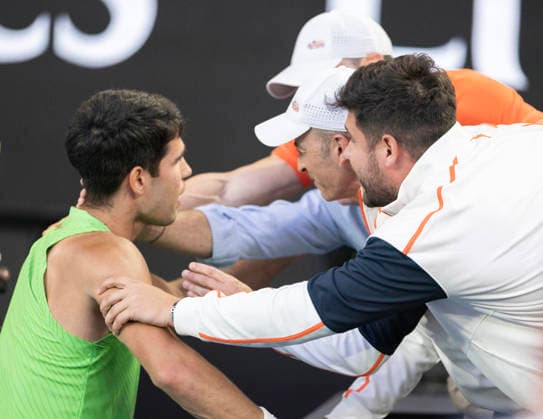 (260130) -- MELBOURNE, Jan. 30, 2026 -- Carlos Alcaraz (L) celebrates with his team members after the men s singles semifinal match between Carlos Alcaraz of Spain and Alexander Zverev of Germany at the Australian Open tennis tournament in Melbourne, Australia, Jan. 30, 2026. (Photo by Xinhua) (SP)AUSTRALIA-MELBOURNE-TENNIS-AUSTRALIAN OPEN-MEN S SINGLES-SEMIFINAL HuxJingchen 