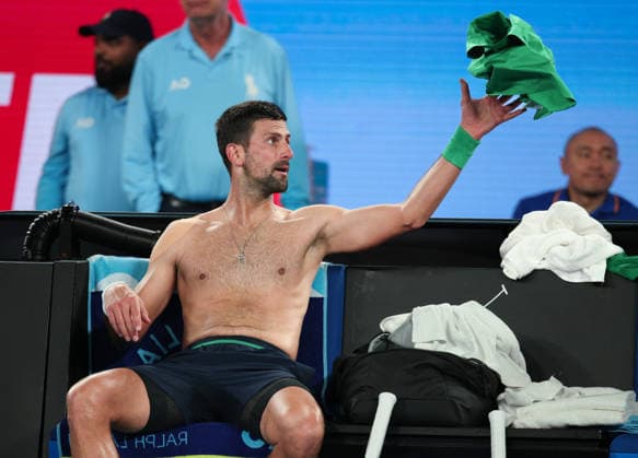 Novak Djokovic SRB sits on the bench during the break in play, Australian Open 2026 Melbourne Park, Melbourne, Victoria, Australia Copyright: xJuergenxHasenkopfx