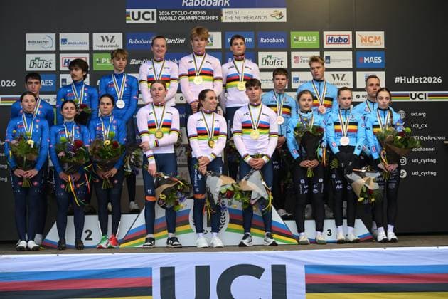 Silver medalists, Italian team, winner Dutch team and bronze medalists, Belgian team with L-R Belgian Fleur Moors, Belgian Julie Brouwers, Belgian Zita Peetersand up L-R, Belgian Jari Van Lee and Belgian Kay De Bruyckere and Belgian Niels Vandeputte celebrate their bronze medal on the podium of the Team Relay race at the UCI Cyclocross World Championships, on Friday 30 January 2026, in Hulst, The Netherlands. DAVIDxPINTENS  x159814701x