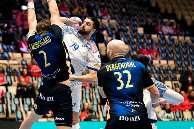 Herning Handball EM 2026 Match Place 5 Portugal Sweden from left Jonathan Carlsbogard Sweden , Portugals Martim Costa, Oscar Bergendahl Sweden Herning Jyske Bank Boxen Denmark