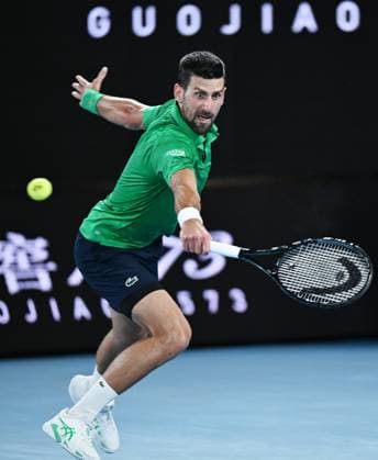(260130) -- MELBOURNE, Jan. 30, 2026 -- Novak Djokovic hits a return during the men s singles semifinal match between Novak Djokovic of Serbia and Jannik Sinner of Italy at the Australian Open tennis tournament in Melbourne, Australia, Jan. 30, 2026. (Photo by Xinhua) (SP)AUSTRALIA-MELBOURNE-TENNIS-AUSTRALIAN OPEN-MEN S SINGLES-SEMIFINAL WangxShen 