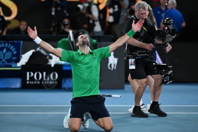 (260130) -- MELBOURNE, Jan. 30, 2026 -- Novak Djokovic reacts after the men s singles semifinal match between Novak Djokovic of Serbia and Jannik Sinner of Italy at the Australian Open tennis tournament in Melbourne, Australia, Jan. 31, 2026. (Photo by Xinhua) (SP)AUSTRALIA-MELBOURNE-TENNIS-AUSTRALIAN OPEN-MEN S SINGLES-SEMIFINAL WangxShen 