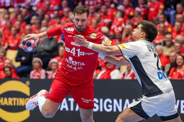 30 01 2026, Handball, Men s EHF EURO 2026, Germany Croatia, Jyske Bank Boxing in Herning, Denmark, Semi Finals Tin Lucin Croatia 41 in duel against Renars Uscins Germany 23 Denmark