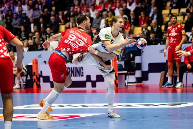 HERNING, DENMARK - JANUARY 30: Juri Knorr (Germany, 15) against Veron Nacinovic (Croatia, 93) during the EHF EURO 2026 Semifinal 1 match between Germany vs Croatia at Jyske Bank Boxen Arena on January 30, 2026 in Herning, Denmark. Midtjylland Denmark Copyright: xMarioxM.xKobergx