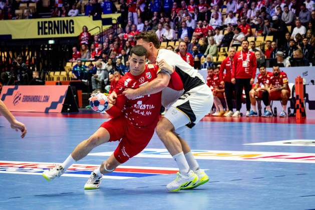 HERNING, DENMARK - JANUARY 30: Diano Cesko (Croatia, 14) against Johannes Golla (Germany, 04) during the EHF EURO 2026 Semifinal 1 match between Germany vs Croatia at Jyske Bank Boxen Arena on January 30, 2026 in Herning, Denmark. Midtjylland Denmark Copyright: xMarioxM.xKobergx