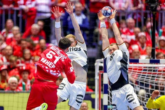 30 01 2026, Handball, Men s EHF EURO 2026, Germany Croatia, Jyske Bank Boxing in Herning, Denmark, Semi Finals Matthes Langhoff Germany 13 Justus Fischer Germany 54 in defense blocking the ball throw from xc61 Denmark